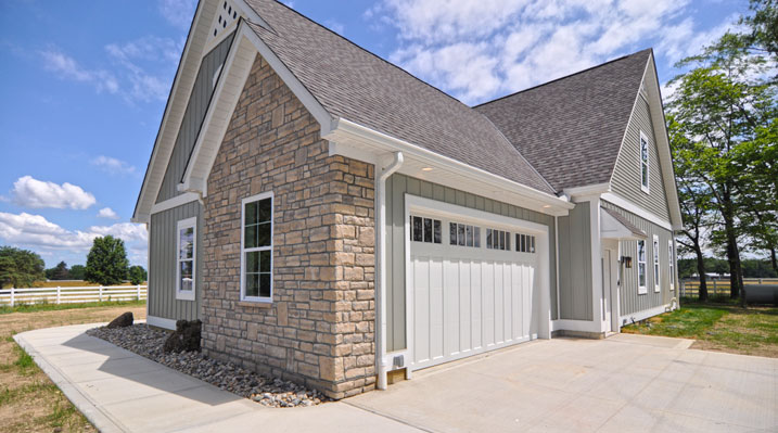 ICH Builders Mt. Sterling residence custom build back of the house showing garage and driveway
